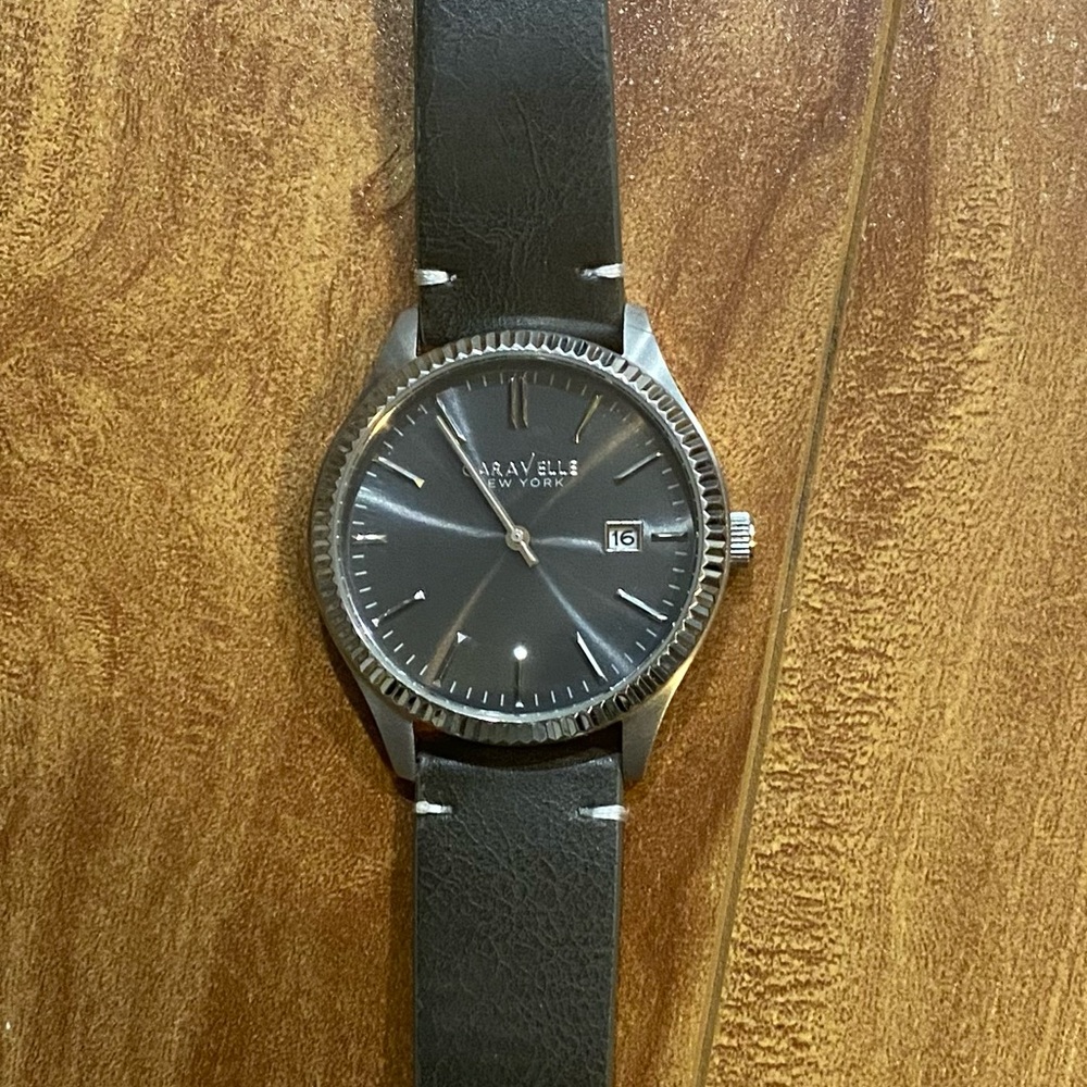 Caravelle Silver Watch Case with green Leather Strap